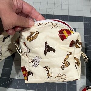 Quilted Cream Pouch with Wizard Print